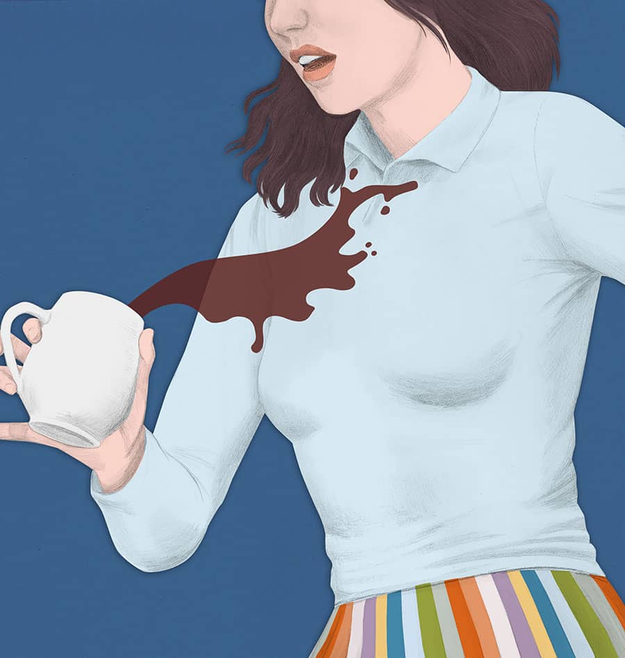 young woman spilling coffee on herself
